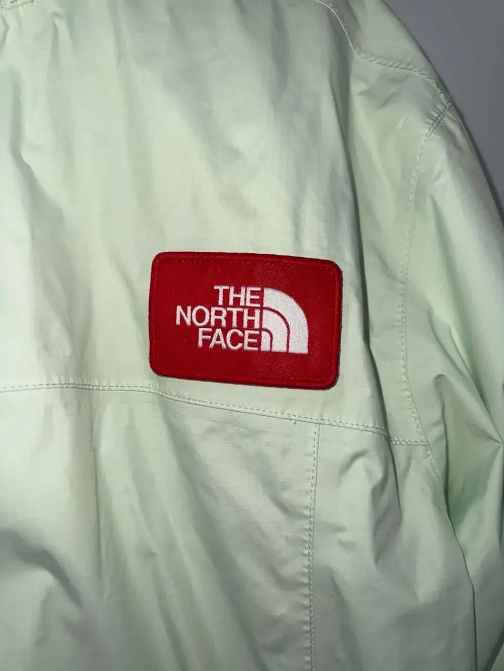 The North Face Men's Size S/P Light Green Hooded Windbreaker Jacket